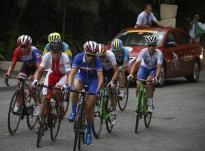 France's Pauline Ferrand Prevot (C) leads the breaks away from the peloton during the Women's road cycling race at the Rio 2016 Olympic Games in Rio de Janeiro on August 7, 2016. / AFP / POOL / ERIC GAILLARD (Photo credit should read ERIC GAILLARD/AFP/Getty Images)
