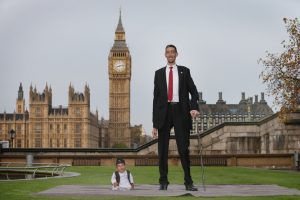 LONDON, ENGLAND - NOVEMBER 13: The shortest man ever, Chandra Bahadur Dangi meets the worlds tallest man, Sultan Kosen for the very first time on November 13, 2014 in London, England. Chandra from Nepal measuring 54.6 cm (21.5 inches) posed for photographers with Sultan from Turkey who is 251 cm (8 ft 3 inches). Today is the 10th annual Guinness World Records Day during which thousands of people are expected to come together to celebrate the international day of record-breaking! (Photo by Peter Macdiarmid/Getty Images)