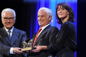 VENICE, ITALY - SEPTEMBER 08: Paolo Baratta and Sophie Marceau attend the Golden Lion For Jean Paul Belmondo Followed By 'Le Voleur' Premiere during the 73rd Venice Film Festival at Palazzo del Cinema on September 8, 2016 in Venice, Italy. (Photo by Camilla Morandi - Corbis/Corbis via Getty Images)