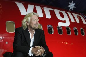 MELBOURNE, AUSTRALIA - SEPTEMBER 12:  Sir Richard Branson celebrates Virgin Blue's 10th Anniversary in Australia at Melbourne Airport on September 12, 2010 in Melbourne, Australia.  (Photo by Robert Prezioso/Getty Images)