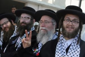 US members of the anti-Zionist religious Jewish community Naturei Karta attend a ceremony at the Palestinian parliament in Gaza City during their visit to the Hamas-run territory July 16, 2009. The group entered the Palestinian enclave late on July 15 with tens of foreign and Arab activists and an aid convoy headed by British MP George Galloway. AFP PHOTO/MAHMUD HAMS (Photo credit should read MAHMUD HAMS/AFP/Getty Images)