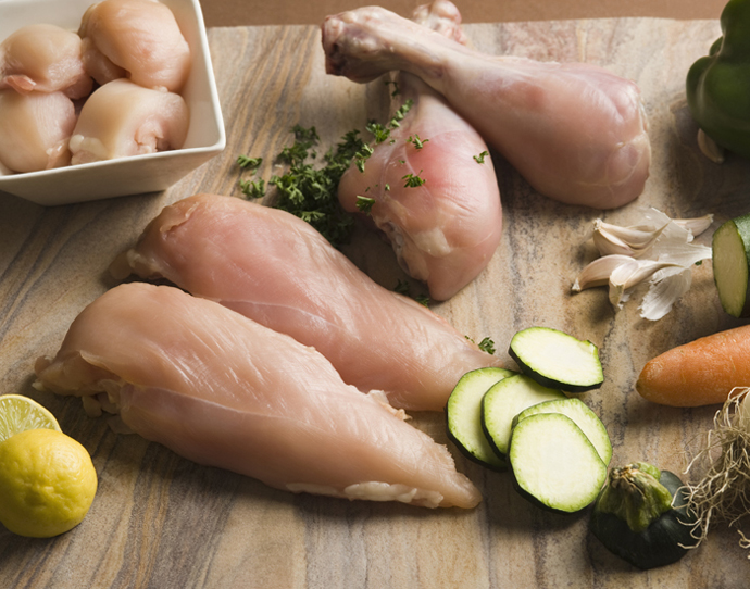 Close-up of raw chicken with vegetables