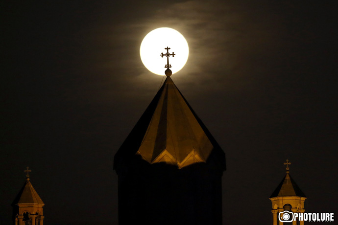 The supermoon rises over the Saint Sargis church in Yerevan, Armenia