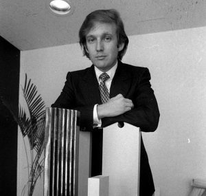 Donald Trump in 1980, with a model of Trump Tower, shortly before he acquired 100 Central Park South.