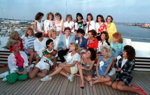 Donald Trump poses with about half of the competing State Misses on board his yacht in Atlantic City, N.J., on Sept. 4, 1988.