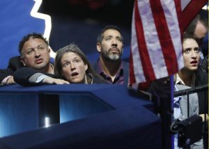 Supporters of Hillary Clinton watch results at the election night rally in New York. REUTERS/Rick Wilking