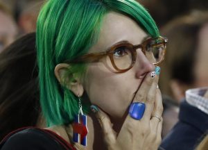 A supporter of Hillary Clinton watches results at her election night rally in Manhattan. REUTERS/Lucas Jackson