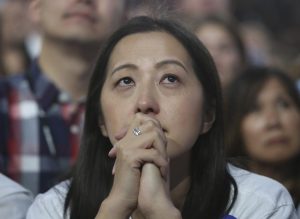 A supporter of Hillary Clinton reacts at her election night rally the Jacob K. Javits Convention Center in New York. REUTERS/Adrees Latif