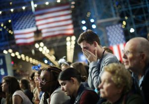 Supporters of Hillary Clinton watch state by state returns at her election night rally in New York. REUTERS/Carlos Barria