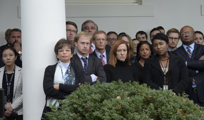 Staff listens as President Barack Obama speaks about the election results in the Rose Garden at the White House in Washington, on Nov. 9, 2016.