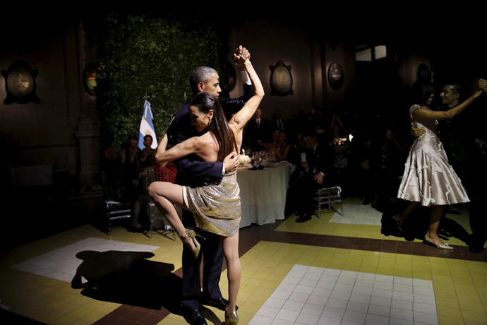 U.S. President Barack Obama dances tango during a state dinner hosted by Argentina's President Mauricio Macri at the Centro Cultural Kirchner as part of President Obama's two-day visit to Argentina, in Buenos Aires on March 23, 2016.